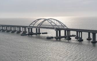 This picture taken on December 23, 2019, shows the Crimean Bridge that spans the Kerch Strait, a narrow strip that links the Azov and Black seas.  - The Russian Presdient on December 23, 2019 stood in the driver's cabin of a train for the official opening of a railway bridge that links annexed Crimea to southern Russia.  (Photo by Alexey NIKOLSKY / SPUTNIK / AFP) (Photo by ALEXEY NIKOLSKY / SPUTNIK / AFP via Getty Images)