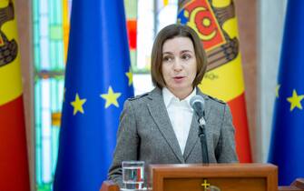 epa09910274 President of Moldova Maia Sandu speaks during briefing at the presidential palace in Chisinau, Moldova, 26 April 2022. President Sandu spoke about the strained situation in Transnistria, a breakaway region of Moldova, with possible escalation and said that Moldova continues to search just on peaceful political solutions, based on dialogue and negotiation, to restore peace and stability in the region.  EPA/DUMITRU DORU