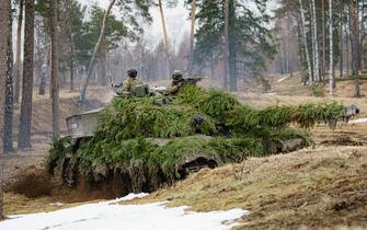 British soldiers mount heavily camouflaged Challenger II tanks on manoeuvres in the Tapa central military training area in Estonia on NATO exercise Bold Dragon alongside Estonian, Danish and French forces. Picture date: Thursday April 14, 2022. (Photo by Ben Birchall/PA Images via Getty Images)