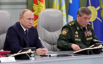 epa07249018 Russian President Vladimir Putin (L) and Head of the Russian Armed Forces General Staff, First Deputy Defense Minister, Army General Valery Gerasimov (R) visit the National Defense Control Center in Moscow, Russia, 26 December 2018. During his visit to the National Defense Control Center, Vladimir Putin watched through a video link a successful test launch of the Avangard intercontinental strategic missile with a gliding hypersonic warhead.  The Avangard hypersonic intercontinental strategic missile system is to enter into service in 2019. EPA / MICHAEL KLIMENTYEV / SPUTNIK / KREMLIN POOL / POOL MANDATORY CREDIT