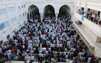 epa09922019 People attend Eid al-Fitr prayers inside Al-Seddik Mosque in Cairo, Egypt, 02 May 2022. Muslims around the world celebrate Eid al-Fitr, the three days festival marking the end of Ramadan. Eid al-Fitr is one of the two major holidays in the Islamic calendar.  EPA/KHALED ELFIQI