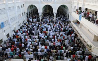 EGYPT BELIEF EID AL FITR epa09922019 People attend Eid al-Fitr prayers inside Al-Seddik Mosque in Cairo, Egypt, 02 May 2022. Muslims around the world celebrate Eid al-Fitr, the three days festival marking the end of Ramadan. Eid al-Fitr is one of the two major holidays in the Islamic calendar. EPA/KHALED ELFIQI