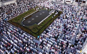 epa09921869 A photo taken with a drone, shows worshipers participating in Eid al-Fitr prayers, signifying the end of the holy month of Ramadan, at Baiturrahman Grand Mosque, Banda Aceh, Indonesia, 02 May 2022. Muslims around the world celebrate Eid al- Fitr, the three day festival marking the end of Ramadan.  Eid al-Fitr is one of the two major holidays in the Islamic calendar.  EPA / HOTLI SIMANJUNTAK