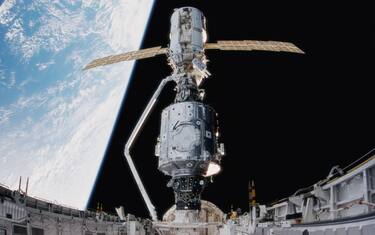 Newly released IMAX images from December 1998, show the crew of Space Shuttle Mission STS-88 beginning construction of the International Space Station, joining the U.S.-built Unity node to the Russian-built Zarya module. (photo by NASA)