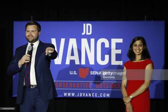 JD Vance, co-founder of Narya Capital Management LLC and U.S. Republican Senate candidate for Ohio, left, with his wife, Usha Vance on stage during a primary election night event in Cincinnati, Ohio U.S., on Tuesday, May 3, 2022. Donald Trump endorsed venture capitalist Vance in a race defined by leading candidates casting themselves as standard bearers of Trump's "America First" movement, mimicking his coarse style. Photographer: Luke Sharrett/Bloomberg via Getty Images
