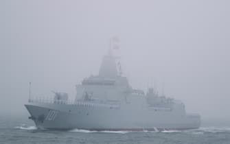 The new type 055 guide missile destroyer Nanchang of the Chinese People's Liberation Army (PLA) Navy participates in a naval parade to commemorate the 70th anniversary of the founding of China's PLA Navy in the sea near Qingdao, in eastern China's Shandong province on April 23, 2019. - China celebrated the 70th anniversary of its navy by showing off its growing fleet in a sea parade featuring a brand new guided-missile destroyer.  (Photo by Mark Schiefelbein / POOL / AFP) (Photo credit should read MARK SCHIEFELBEIN / AFP via Getty Images)