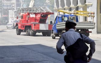1240485953 Rescuers work after an explosion in the Saratoga Hotel in Havana, on May 6, 2022. - A powerful explosion Friday destroyed part of a hotel under repair in central Havana, AFP witnessed, with no casualties immediately reported. (Photo by ADALBERTO ROQUE / AFP) (Photo by ADALBERTO ROQUE/AFP via Getty Images)