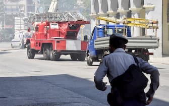 Rescuers work after an explosion in the Saratoga Hotel in Havana, on May 6, 2022. - A powerful explosion Friday destroyed part of a hotel under repair in central Havana, AFP witnessed, with no casualties immediately reported. (Photo by ADALBERTO ROQUE / AFP) (Photo by ADALBERTO ROQUE/AFP via Getty Images)