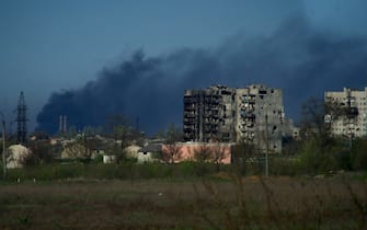 TOPSHOT - Smoke rises from the grounds of the Azovstal steel plant in the city of Mariupol on April 29, 2022, amid the ongoing Russian military action in Ukraine.  (Photo by Andrey BORODULIN / AFP) (Photo by ANDREY BORODULIN / AFP via Getty Images)