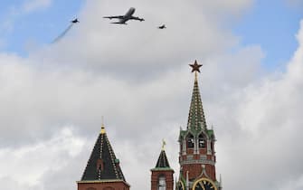 Russian MiG-29i fighter jets and Ilyushin Il-80 airborne command and control aircraft fly over Red Square in Moscow during a rehearsal for the WWII Victory Parade on May 4, 2022. - Russia will celebrate the 77th anniversary of the 1945 victory over Nazi Germany on May 9. (Photo by Natalia KOLESNIKOVA / AFP) (Photo by NATALIA KOLESNIKOVA/AFP via Getty Images)