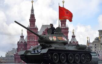 A Soviet era T-34 tank parades through Red Square during the Victory Day military parade in central Moscow on May 9, 2022. - Russia celebrates the 77th anniversary of the victory over Nazi Germany during World War II. (Photo by Alexander NEMENOV / AFP) (Photo by ALEXANDER NEMENOV/AFP via Getty Images)