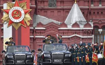Russian Defence Minister Sergei Shoigu salutes to soldiers as he is driven along Red Square during the Victory Day military parade in central Moscow on May 9, 2022. - Russia celebrates the 77th anniversary of the victory over Nazi Germany during World War II. (Photo by Alexander NEMENOV / AFP) (Photo by ALEXANDER NEMENOV/AFP via Getty Images)