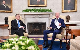US President Joe Biden meets with Italian Prime Minister Mario Draghi in the Oval Office of the White House in Washington, DC, on May 10, 2022. (Photo by Nicholas Kamm / AFP) (Photo by NICHOLAS KAMM/AFP via Getty Images)