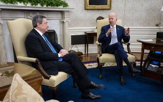 1240582211 U.S. President Joe Biden, right, meets with Mario Draghi, Italy's prime minister, in the Oval Office of the White House in Washington, D.C., US, on Tuesday, May 10, 2022. Draghi is pushing for the EU to ban Russian oil imports and has backed sending heavy weapons to Ukraine, something resisted by large parts of his ruling coalition amid Italy's historically strong ties to Russia. Photographer: Doug Mills/The New York Times/Bloomberg