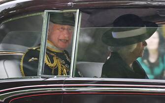 BRITAIN ROYALTY PARLIAMENT epa09937801 Britain's Prince Charles travels by car with his wife Camilla, Duchess of Cornwall, to parliament ahead of the State Opening of Parliament in London, Britain, 10 May 2022. Charles is representing the Queen who will be absent for the first time in over fifty years. Buckingham Palace announced that for the first time since 1963 Queen Elizabeth II would not be delivering the Queen s Speech. The UK government are set to introduce 38 new laws including the controversial Public Order Act. EPA/ANDY RAIN