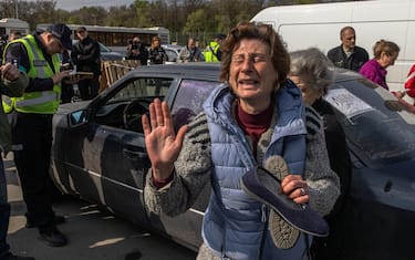 Natalia reacts after arriving from Mariupol to an evacuation point in Zaporizhzhia, Ukraine, 02 May 2022. ANSA/ROMAN PILIPEY