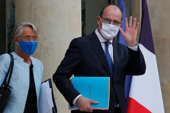 French Prime Minister Jean Castex (R) and French Labor Minister Elisabeth Borne leave the Elysee Presidential Palace after a weekly cabinet meeting on September 23, 2020 in Paris.  (Photo by GEOFFROY VAN DER HASSELT / AFP) (Photo by GEOFFROY VAN DER HASSELT / AFP via Getty Images)