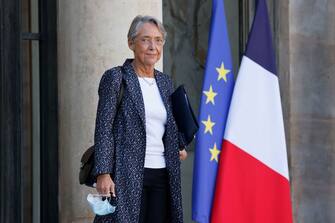 France's Labour Minister Elisabeth Borne leaves the Elysee palace at the end of the weekly cabinet meeting, in Paris, on February 9, 2022. (Photo by Ludovic MARIN / AFP) (Photo by LUDOVIC MARIN/AFP via Getty Images)