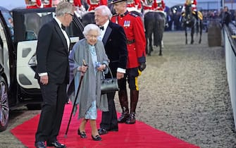 WINDSOR, ENGLAND - MAY 15: Queen Elizabeth II arrives for the "A Gallop Through History" performance as part of the official celebrations for Queen Elizabeth II's Platinum Jubilee at the Royal Windsor Horse Show at Home Park on May 15, 2022 in Windsor, England.The Royal Windsor Horse Show continued the Platinum Jubilee celebrations with the â  A Gallop Through Historyâ   event. Each evening, the Platinum Jubilee celebration saw over 500 horses and 1,000 performers create a 90-minute production that took the audience on a â  gallop through historyâ   from Elizabeth I to the present day. (Photo by Steve Parsons - WPA Pool/Getty Images)
