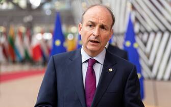 BRUSSELS, BELGIUM - MAY 24: Irish Taoiseach (Prime Minister) Micheal Martin talks to media as he arrives for an extraordinary EU Summit on May 24, 2021 in Brussels, Belgium. European Union leaders are expected, during a two days meeting, to focus on foreign relations, including Russia, Belarus and the United Kingdom. (Photo by Thierry Monasse#51SY ED/Getty Images)