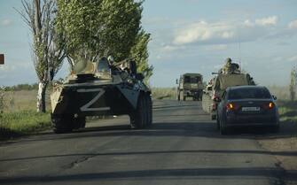 MARIUPOL, UKRAINE - MAY 17: Surrendered servicemen of Ukraine's national battalion "Azov", which is an all-volunteer infantry military unit, are being transferred to Yelenovka in Mariupol, Ukraine on May 17, 2022. (Photo by Leon Klein/Anadolu Agency via Getty Images)