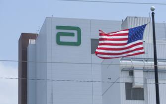 An American flag outside the Abbott Nutrition factory in Sturgis, Michigan, US, on Thursday, May 19, 2022. A leading House Democrat plans to grill the Food and Drug Administration’s chief about plans to reopen an Abbott Laboratories infant formula plant without first addressing a whistle-blower’s allegations. Photographer: Matthew Hatcher/Bloomberg