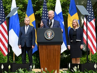 WASHINGTON, DC - MAY 19: U.S. President Joe Biden speaks as Finland's president Sauli Niinisto (L) and Sweden's prime minister Magdalena Andersson (R) listen during a news conference in the Rose Garden at the White House on May 19, 2022 in Washington, DC. (Photo by Chen Mengtong/China News Service via Getty Images)