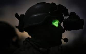 STENNIS SPACE CENTER, MS - FEBRUARY 20:  An active-duty Special Boat Team member from the Navy's riverine Gulf Coast team peers through a night vision device while patrolling the Pearl River on a night training operation on February 20, 2013 in the swamps of the John C. Stennis Space Center in Stennis Space Center, Mississippi. Special Warfare Combatant-Craft Crewmen, or SWCCs, are members of the United States Navy's Special Boat Teams and are responsible for insertion, extraction, and combat fire support for the U.S. Navy SEALs. Ninety percent of riverine training takes place at night, due to the enormous advantage afforded to American special operations forces because of their extensive night vision capabilities.
(Photo by Luke Sharrett/Getty Images)