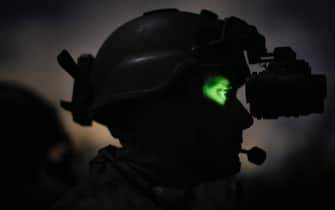 182601653 STENNIS SPACE CENTER, MS - FEBRUARY 20: An active-duty Special Boat Team member from the Navy's riverine Gulf Coast team peers through a night vision device while patrolling the Pearl River on a night training operation on February 20, 2013 in the swamps of the John C. Stennis Space Center in Stennis Space Center, Mississippi. Special Warfare Combatant-Craft Crewmen, or SWCCs, are members of the United States Navy's Special Boat Teams and are responsible for insertion, extraction, and combat fire support for the U.S. Navy SEALs. Ninety percent of riverine training takes place at night, due to the enormous advantage afforded to American special operations forces because of their extensive night vision capabilities.
(Photo by Luke Sharrett/Getty Images)