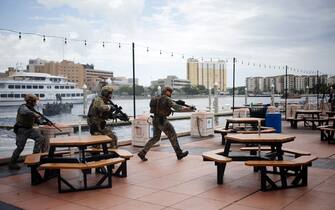 A Marine Corps Forces Special Operations Command (MARSOC) Raider and other special operations partners participate in an International Special Operations Forces capacities exercise rehearsal outside the Special Operations Forces Industry Conference (SOFIC) in Tampa, Florida, U.S., on Tuesday, May 22, 2018. The conference offers the SOF community a place to interact with industry and to collaborate on the challenges, initiatives and way-ahead in delivering the most cutting-edge capabilities into the hands of SOF operators. Photographer: Luke Sharrett/Bloomberg