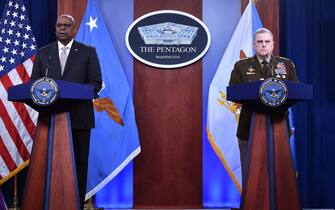 US Defense Secretary Lloyd Austin (L) and Chairman of the Joint Chiefs of Staff General Mark Milley hold a press briefing at the Pentagon in Washington, DC, on May 23, 2022. (Photo by Nicholas Kamm / AFP) (Photo by NICHOLAS KAMM/AFP via Getty Images)