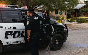 UVALDE, TX - MAY 24: Uvalde Police gather outside the home of 18 year old Salvador Ramos who killed 21 people including 19 children at a local elementary school on May 24, 2022 in Uvalde, Texas. The shooter, identified as 18 year old Salvador Ramos, was reportedly killed by law enforcement.(Photo by Jordan Vonderhaar/Getty Images)