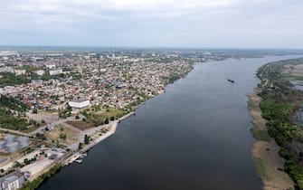 An aerial view shows the city of Kherson on May 20, 2022, amid the ongoing Russian military action in Ukraine. - Authorities in the Moscow-controlled Ukrainian region of Kherson announced on May 23 the introduction of the ruble as an official currency alongside the Ukrainian hryvnia. The region's capital Kherson was the first major city to fall to Russian forces after the start of Moscow's military operation in Ukraine on February 24. (Photo by Andrey BORODULIN / AFP) (Photo by ANDREY BORODULIN/AFP via Getty Images)