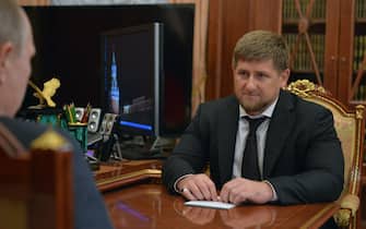 Russian President Vladimir Putin (L) speaks with the Head of the Chechen Republic Ramzan Kadyrov (R) during a working meeting in the Kremlin in Moscow, Russia, 04 December 2014. ANSA/ALEXEI DRUZHININ / RIA NOVOSTI / KREMLIN POOL