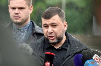 Denis Pushilin (C), leader of the separatists in the self-proclaimed Donetsk People's Republic (DNR), speaks to the media in Ukraine's port city of Mariupol on May 18, 2022, amid the ongoing Russian military action in Ukraine. (Photo by Olga MALTSEVA / AFP) (Photo by OLGA MALTSEVA/AFP via Getty Images)