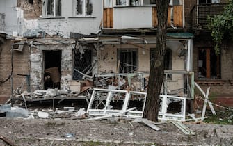 A picture taken on May 18, 2022 shows a damaged building during nearby mortar shelling in Severodonetsk, eastern Ukraine, on the 84th day of the Russian invasion of Ukraine. (Photo by Yasuyoshi CHIBA / AFP) (Photo by YASUYOSHI CHIBA/AFP via Getty Images)