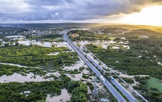 JABOATAO DOS GUARARAPES, BRAZIL - MAY 30: An aerial view of flooded area in Jaboatao dos Guararapes, in Recife, Pernambuco State, Brazil, on May 30, 2022. The death toll from the landslides and floods caused by heavy rains rose to 100 on Tuesday in the metropolitan region of Recife. The floods and landslides triggered by heavy rains killed 100 people and displaced hundreds of others. The number of people missing, which was previously reported at 56, still could not be determined clearly as search and rescue efforts are underway to reach out to the marooned people. (Photo by Diogo Duarte/Anadolu Agency via Getty Images)