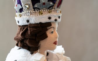 Detail of a life-size knitted model of Queen Elizabeth II at the Church of the Holy Cross in Caston near Norwich, Norfolk, where it will go on display during the Platinum Jubilee celebrations. The woolen creation was originally made by Lois Gill, Penny Evans and a local group of knitters for the 65th anniversary of the Queen's coronation in 2017 and took 6 months to finish with over 1000 balls of wool used. Picture date: Tuesday May 31, 2022.