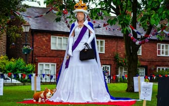 A life size knitted Queen and corgi in the village of Holmes Chapel in Cheshire, ahead of the Platinum Jubilee celebrations. Picture date: Tuesday May 31, 2022.