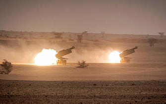 US M142 High Mobility Artillery Rocket System (HIMARS) launchers fire salvoes during the "African Lion" military exercise in the Grier Labouihi region in southeastern Morocco on June 9, 2021. (Photo by FADEL SENNA / AFP) (Photo by FADEL SENNA/AFP via Getty Images)