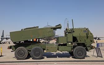 A US M142 HIMARS rocket launcher is parked on the tarmac at the 2021 Dubai Airshow in the Gulf emirate on November 15, 2021. (Photo by Giuseppe CACACE / AFP) (Photo by GIUSEPPE CACACE/AFP via Getty Images)