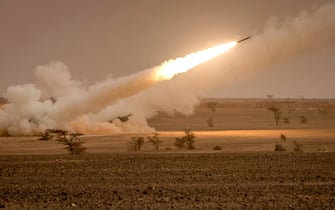 US M142 High Mobility Artillery Rocket System (HIMARS) launchers fire salvoes during the "African Lion" military exercise in the Grier Labouihi region in southeastern Morocco on June 9, 2021. (Photo by FADEL SENNA / AFP) (Photo by FADEL SENNA/AFP via Getty Images)
