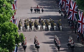Brigade major James Shaw (C top) leads members of the Household Cavalry to Horseguards Parade to take part in the Queen's Birthday Parade, the Trooping the Colour, as part of Queen Elizabeth II's Platinum Jubilee celebrations, in London on June 2, 2022. - Huge crowds converged on central London in bright sunshine on Thursday for the start of four days of public events to mark Queen Elizabeth II's historic Platinum Jubilee, in what could be the last major public event of her long reign. (Photo by Paul ELLIS / POOL / AFP) (Photo by PAUL ELLIS/POOL/AFP via Getty Images)
