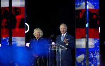 The Prince of Wales accompanied by the Duchess of Cornwall, speaks on stage during the Platinum Party at the Palace staged in front of Buckingham Palace, London, on day three of the Platinum Jubilee celebrations for Queen Elizabeth II. Picture date: Saturday June 4, 2022. (Photo by Kirsty O'Connor/PA Images via Getty Images)