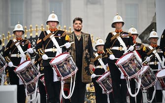 LONDON, ENGLAND - JUNE 04:  Adam Lambert and Queen perform onstage during the Platinum Party At The Palace on June 04, 2022 in London, England. The Platinum Jubilee of Elizabeth II is being celebrated from June 2 to June 5, 2022, in the UK and Commonwealth to mark the 70th anniversary of the accession of Queen Elizabeth II on 6 February 1952.  (Photo by Jeff J Mitchell - WPA Pool/Getty Images)