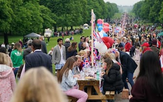 Members of the local community participate in the Big Jubilee Lunch at 'The Long Table' on The Long Walk, Windsor Castle, on day four of the Platinum Jubilee celebrations. Picture date: Sunday June 5, 2022. (Photo by Steve Parsons/PA Images via Getty Images)