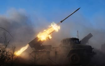 DEBALTSEVE, UKRAINE - FEBRUARY 13: Pro Russian rebels fire grad rockets on Ukrainian positions under orders of Olga Sergeevna, also known as Corsa, on February 13, 2015 in Debaltseve, Ukraine.   Corsa is the only woman commander of a artillery unit fighting for the Donetsk People's Republic . The leaders of Russia, Ukraine, Germany and France have announced that they have reached a ceasefire deal, that is due to begin on February 15. (Photo by Pierre Crom/Getty Images)