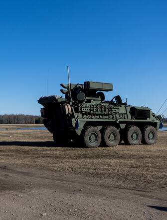 KAZLU RUDA, LITHUANIA - MARCH 01: Members of US army near M-SHORAD Stryker Air Defence vehicle on March 1, 2022 in Kazlu Ruda, Lithuania. Saber Strike 2022 is an element of the large-scale exercise Defender-Europe 2022 military drills between U.S. troops and allied forces. (Photo by Paulius Peleckis/Getty Images)