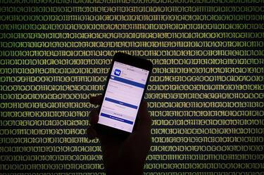 The Russian social media app and competitor of Facebook, VKontatke is seen on a smartphone browser in front of a binary background, in Bydgoszcz, on August 7, 2016. (Photo by Jaap Arriens/NurPhoto via Getty Images)