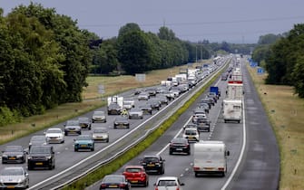 Traffic on the A1 highway in Voorthuizen, the Netherlands, 06 June 2022. A number of Dutch roads are crowded due to returning holidaymakers and people on their way to recreational destinations as Whit Monday is a public holiday in the Netherlands.  ANSA/Robin van Lonkhuijsen